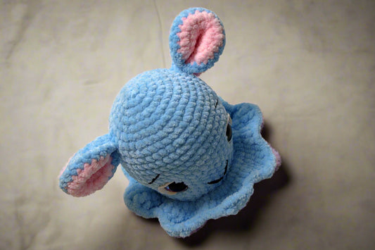 Handmade crochet Dumbo the octopus from the amigurumi marine collection of the baseline handicraft, crafted in France with love.