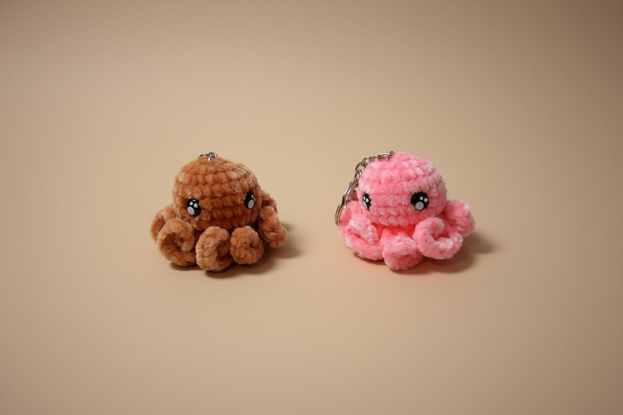 Handmade crochet keychain octopus from the amigurumi marine life collection of the baseline handicraft, crafted in France with love.