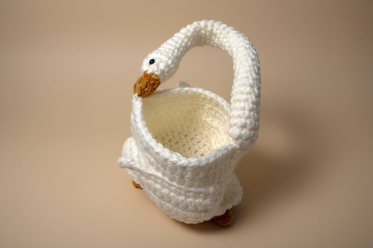 Handmade crochet swan hand bag from the wearables bag collection of the baseline handicraft, crafted in France with love.