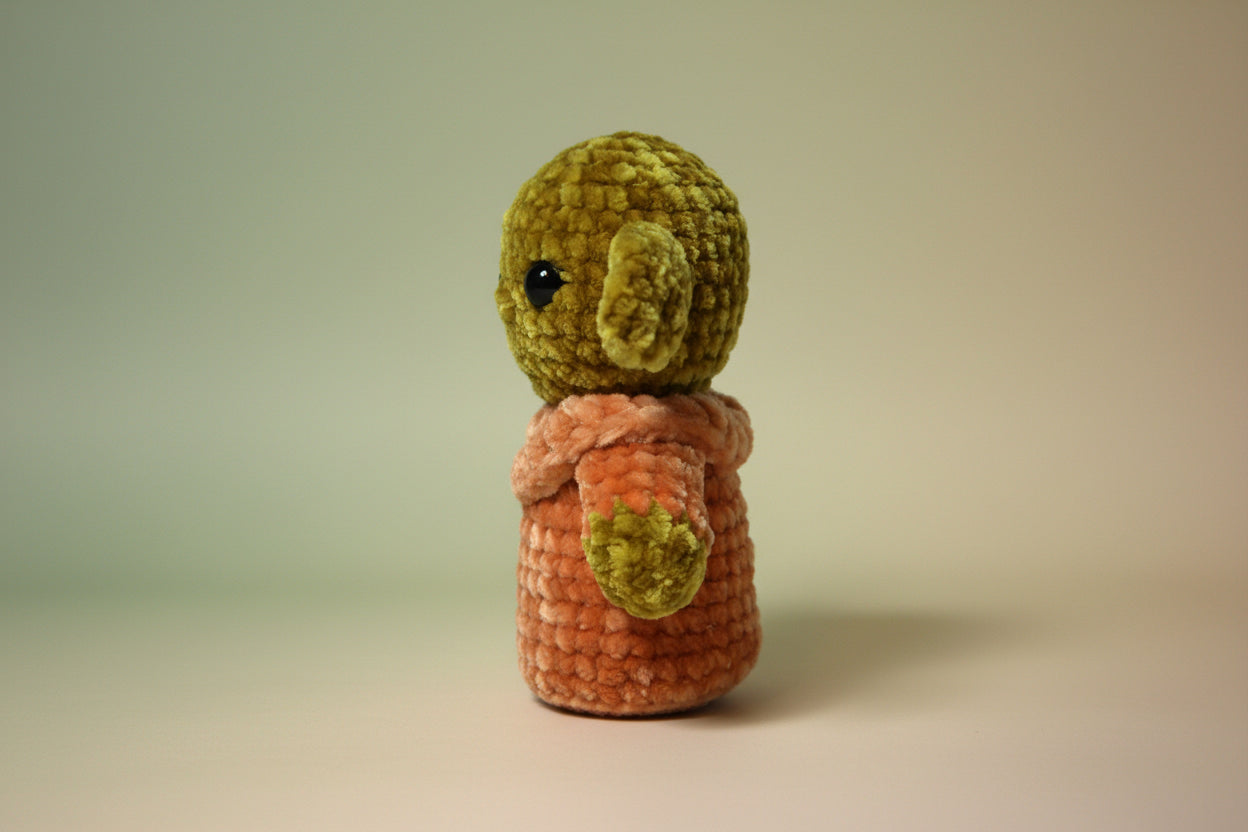 Handmade crochet alien Yo the green from the amigurumi collection of the baseline handicraft, crafted in France with love.
