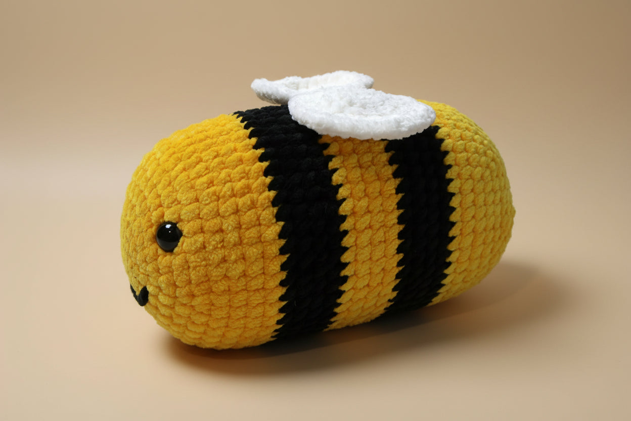 Handmade crochet bee from the amigurumi collection of the baseline handicraft, crafted in France with love. 