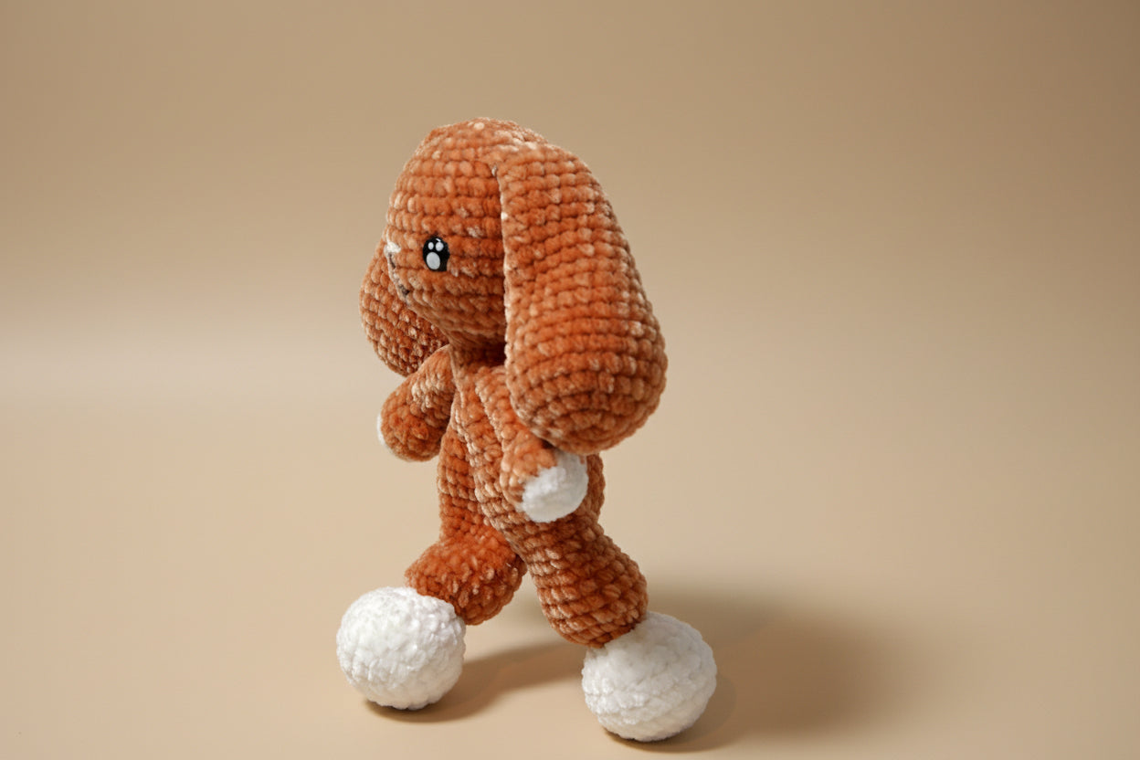 Handmade crochet bunny snuggler from the comforter collection of the baseline handicraft, crafted in France with love. 