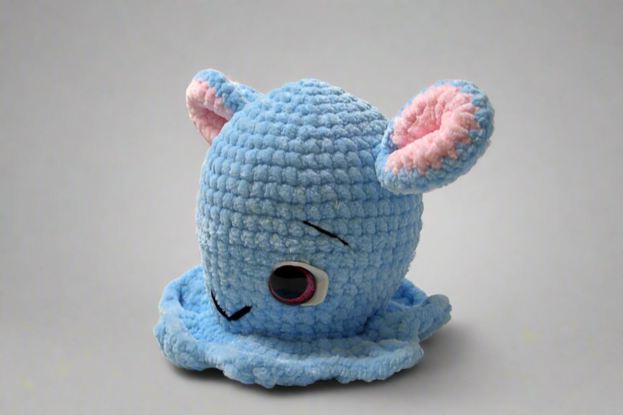 Handmade crochet Dumbo the octopus from the amigurumi marine collection of the baseline handicraft, crafted in France with love. 