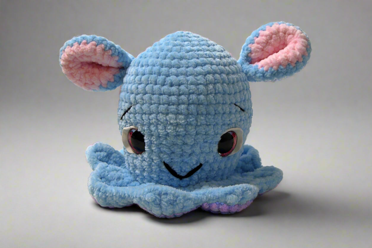 Handmade crochet Dumbo the octopus from the amigurumi marine collection of the baseline handicraft, crafted in France with love. 