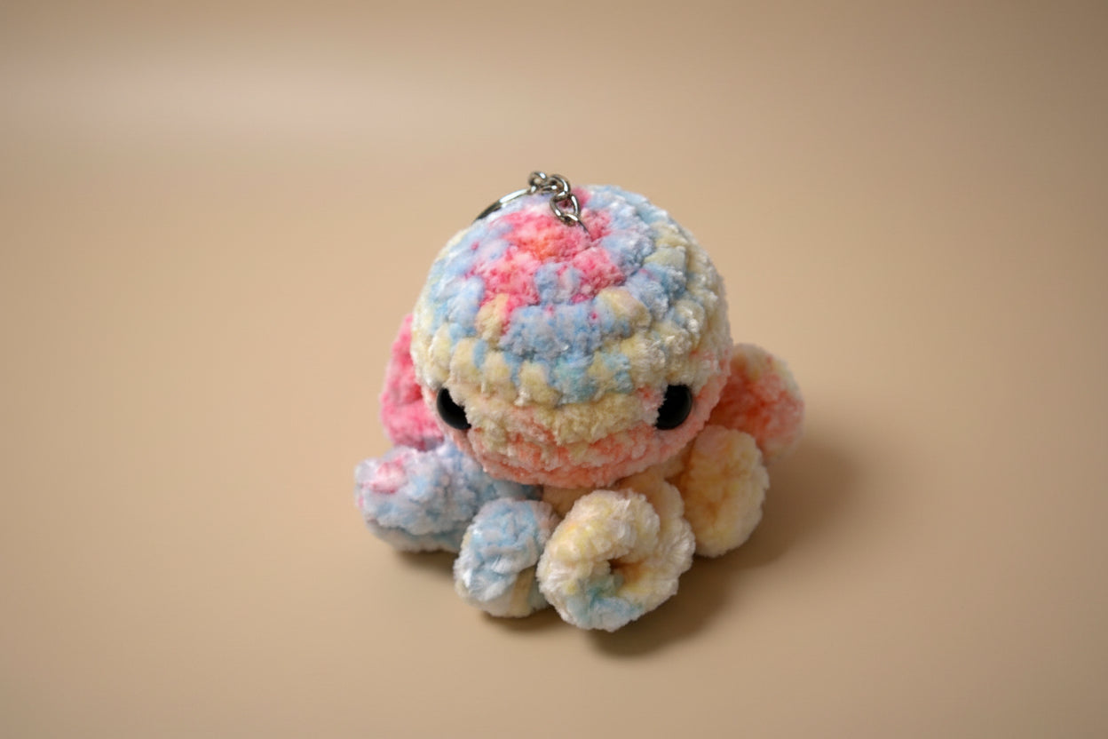 Handmade crochet keychain mini octopus from the amigurumi marine life collection of the baseline handicraft, crafted in France with love. 