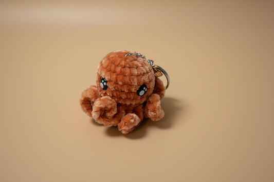 Handmade crochet keychain octopus from the amigurumi marine life collection of the baseline handicraft, crafted in France with love. 