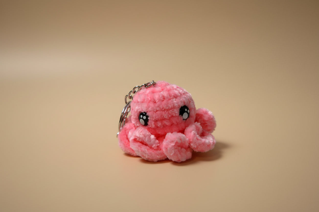 Handmade crochet keychain octopus from the amigurumi marine life collection of the baseline handicraft, crafted in France with love. 