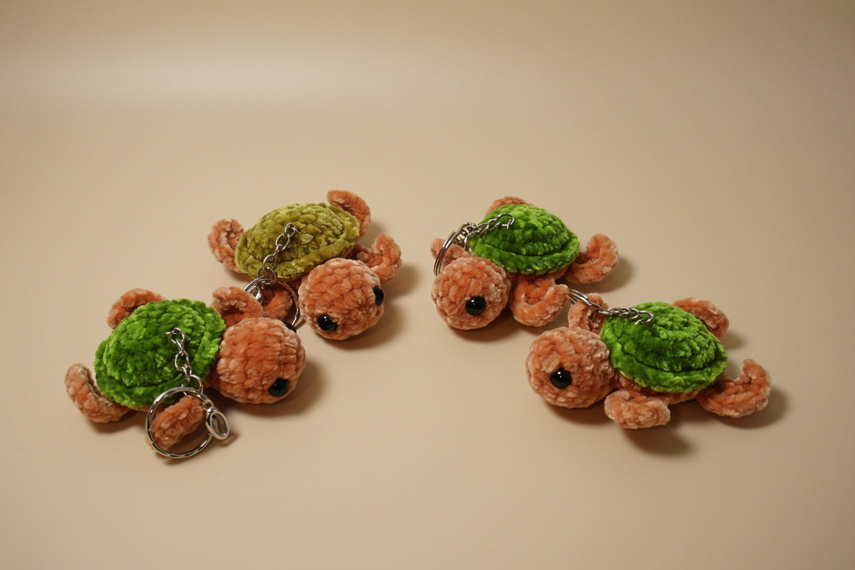Handmade crochet keychain turtle from the marine life collection of the baseline handicraft, crafted in France with love. 