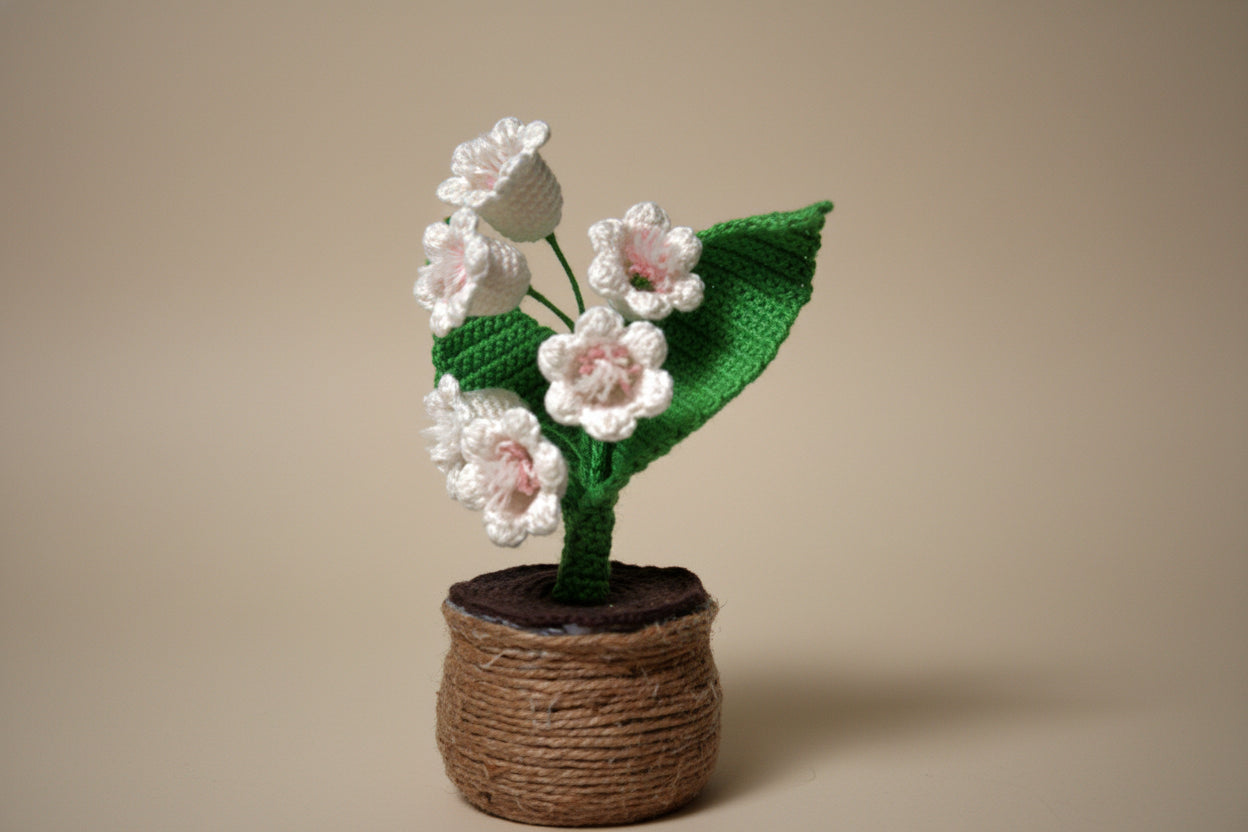 Handmade crochet lily of the valley from the crocheted flower collection, crafted in France.