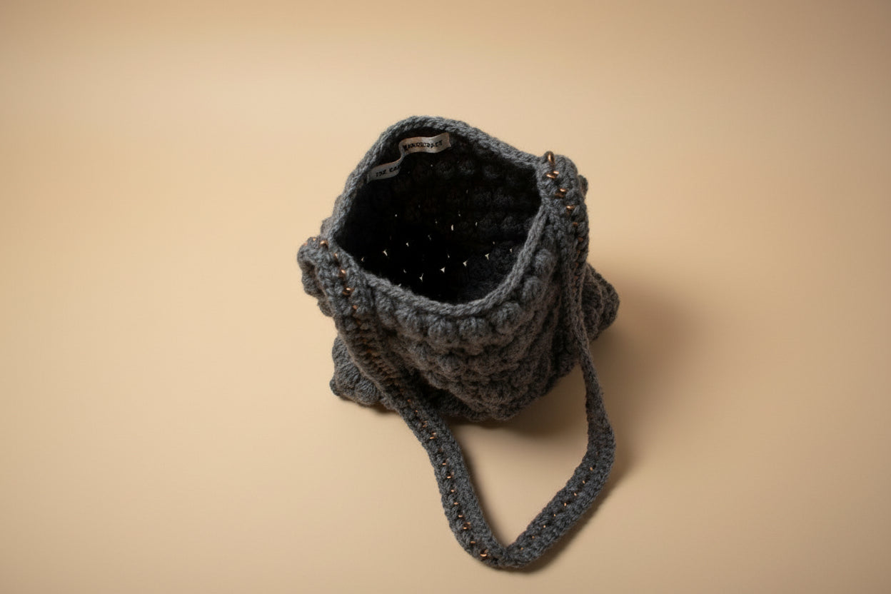 Handmade crochet mini pouch purse from the wearables bag collection of the baseline handicraft, crafted in France with love. 