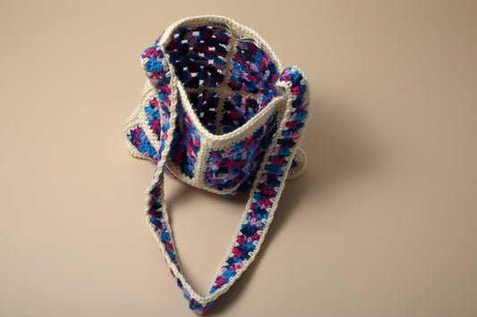Handmade crochet mini bag purse from the wearables bag collection of the baseline handicraft, crafted in France with love. 