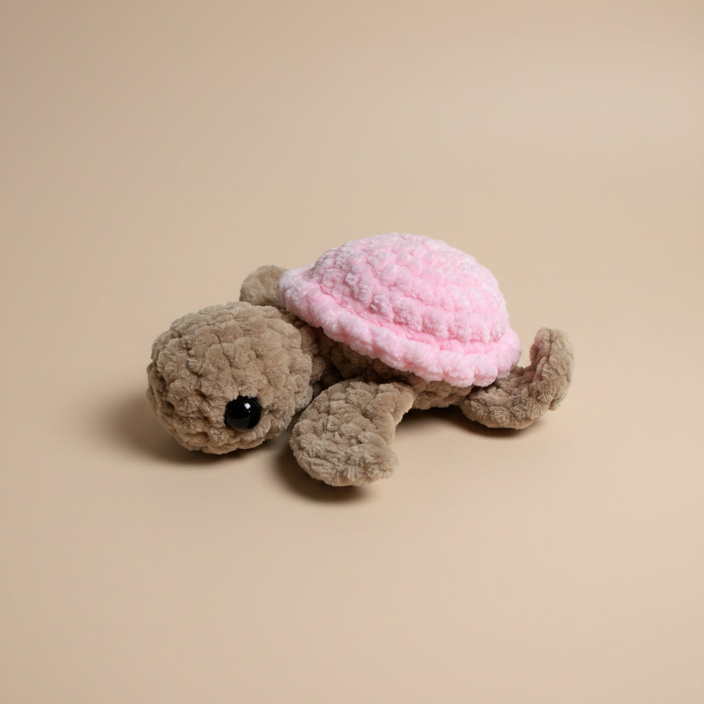 Handmade crochet mini turtle plushie from the amigurumi marine life collection of the baseline handicraft, crafted in France with love. 