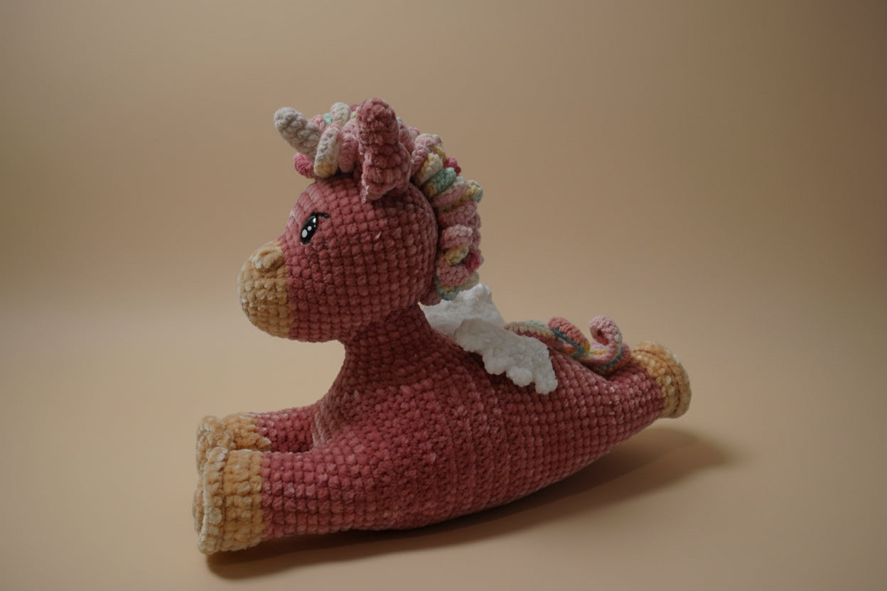 Handmade crochet twinkle peagasus from the amigurumi collection of the baseline handicraft, crafted in France with love.