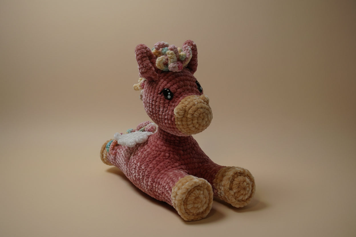 Handmade crochet twinkle peagasus from the amigurumi collection of the baseline handicraft, crafted in France with love.